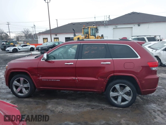 2014 Jeep Grand Cherokee Overland with VIN 1C4RJFCG9EC299235, listed as a IAAI auction lot 41670065 with 108,589 mi miles and . Bid and sale history available at DreamBid. Image 14.