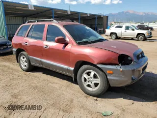 2002 Hyundai Santa Fe GLS with VIN KM8SC73D42U231286, listed as a Copart auction lot 71290624 with 187,534 mi miles and Salvage Title. Bid and sale history available at carsss.com. Image 4.