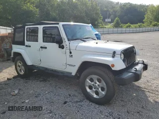 2014 Jeep Wrangler Unlimited Sahara с VIN 1C4BJWEG1EL322781, выставлен на аукционе Copart как лот 64200145 с пробегом 119 500 миль миль и Чистый • Clean title. История ставок и продаж доступна на DreamBid. Изображение 4.