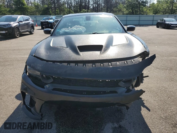 2016 Dodge Charger R/T with VIN 2C3CDXCT1GH204252, listed as a Copart auction lot 61090155 with 153,395 mi miles and Salvage title. Bid and sale history available at DreamBid. Image 5.
