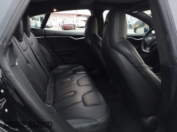 2016 Tesla Model S 70 with VIN 5YJSA1E1XGF154577, listed as a IAAI auction lot 41778697 with 62,630 mi miles and . Bid and sale history available at DreamBid. Image 8.