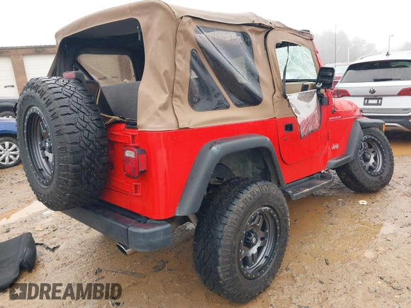 2000 Jeep Wrangler SE with VIN 1J4FA29P7YP793068, listed as a IAAI auction lot 41576287 with 113,298 mi miles. Bid and sale history available at carsss.com. Image 4.