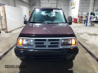 1998 Chevrolet Tracker z VIN 2CNBJ1362W6919635, wystawiony jako Copart lot #56894355 z przebiegiem 140 298 mil mil oraz Szkoda całkowita • Salvage title. Historia ofert i sprzedaży dostępna na DreamBid. Obrazek 5.