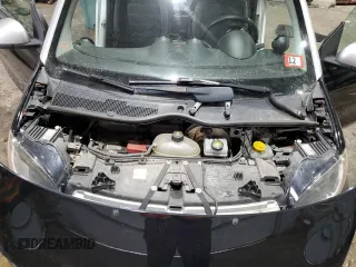 2016 Smart fortwo Passion z VIN WMEFJ5DA9GK067011, wystawiony jako Copart lot #46152325 z przebiegiem 61 195 mil mil oraz Szkody całkowita. Historia ofert i sprzedaży dostępna na DreamBid. Obrazek 11.
