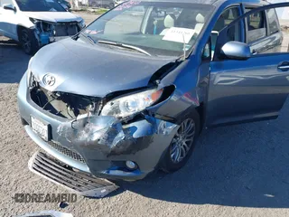 2016 Toyota Sienna XLE with VIN 5TDYK3DC8GS720852, listed as a IAAI auction lot 41341268 with 119,927 mi miles. Bid and sale history available at carsss.com. Image 19.