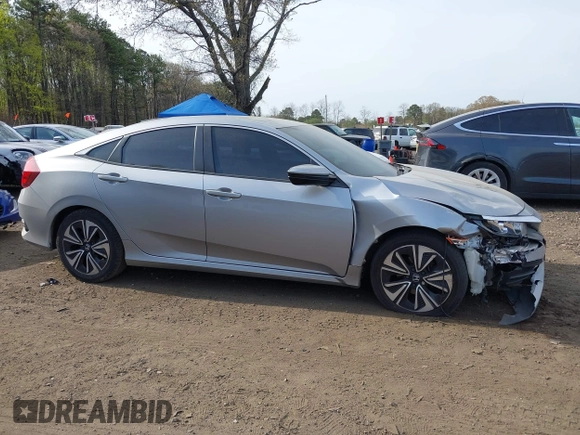 2018 Honda Civic Sedan LX with VIN 2HGFC2F5XJH573938, listed as a IAAI auction lot 42098109 with 69,037 mi miles. Bid and sale history available at carsss.com. Image 13.