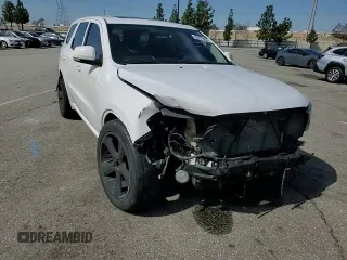 2013 Dodge Durango R/T with VIN 1C4SDHCT2DC559006, listed as a Copart auction lot 49275695 with 117,323 mi miles and Salvage title. Bid and sale history available at DreamBid. Image 12.