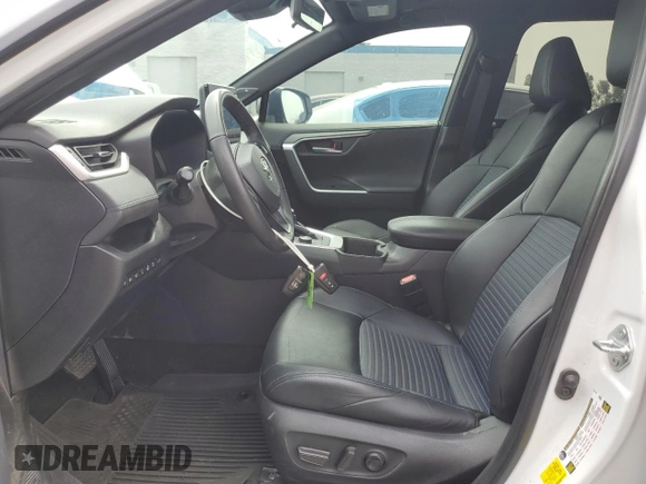 2024 Toyota RAV4 Hybrid XSE with VIN 4T3E6RFV0RU141591, listed as a Copart auction lot 59623085 with 27,682 mi miles and Salvage title. Bid and sale history available at DreamBid. Image 7.