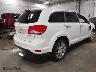 2014 Dodge Journey Limited with VIN 3C4PDCDG6ET151821, listed as a IAAI auction lot 41502752 with 151,280 mi miles. Bid and sale history available at carsss.com. Image 4.