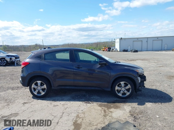 2018 Honda HR-V LX with VIN 3CZRU6H37JG708010, listed as a IAAI auction lot 42059990 with 100,822 mi miles. Bid and sale history available at carsss.com. Image 14.