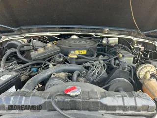 1987 Jeep Grand Wagoneer z VIN 1JCNJ15U7HT153505, wystawiony jako Copart lot #46373925 z przebiegiem 57 931 mil mil oraz Czysty tytuł • Clean title. Historia ofert i sprzedaży dostępna na DreamBid. Obrazek 7.