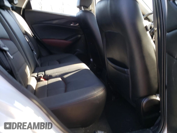 2016 Mazda CX-3 Touring z VIN JM1DKFC77G0136787, wystawiony jako Copart lot #50697845 z przebiegiem 96 277 mil mil oraz Szkoda całkowita • Salvage title. Historia ofert i sprzedaży dostępna na DreamBid. Obrazek 10.