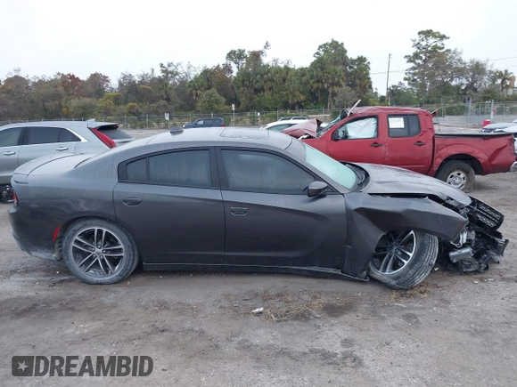 2019 Dodge Charger SXT with VIN 2C3CDXJG1KH730489, listed as a IAAI auction lot 41189171 with 39,514 mi miles and . Bid and sale history available at DreamBid. Image 13.