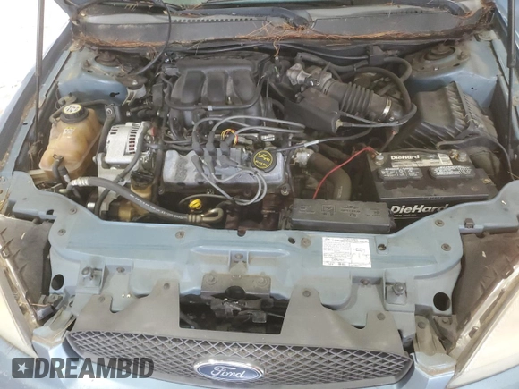 2007 Ford Taurus SE with VIN 1FAFP53U17A215432, listed as a Copart auction lot 64029215 with 121,190 mi miles and Salvage title. Bid and sale history available at DreamBid. Image 11.