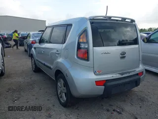 2011 Kia Soul + with VIN KNDJT2A2XB7705227, listed as a IAAI auction lot 41942432 with 293,320 mi miles. Bid and sale history available at carsss.com. Image 3.
