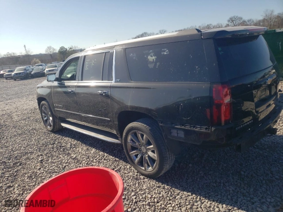 2015 Chevrolet Suburban LTZ with VIN 1GNSCKKC1FR713083, listed as a Copart auction lot 48213585 with 178,321 mi miles and Salvage Title. Bid and sale history available at carsss.com. Image 2.