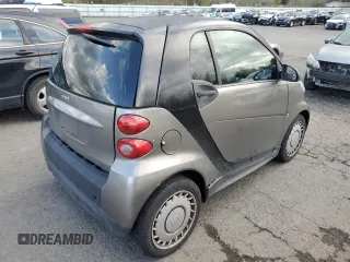 2013 Smart fortwo Pure with VIN WMEEJ3BA6DK653471, listed as a Copart auction lot 51864365 with 129,778 mi miles and Clean Title. Bid and sale history available at DreamBid. Image 3.