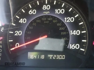 2006 Honda Odyssey EX-L with VIN 5FNRL38766B038599, listed as a IAAI auction lot 41989217 with 164,118 mi miles. Bid and sale history available at carsss.com. Image 7.