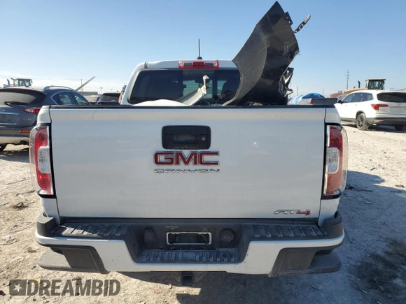 2021 GMC Canyon 4WD AT4 w/Leather with VIN 1GTG6FEN0M1122894, listed as a Copart auction lot 85734544 with 108,366 mi miles and Salvage Title. Bid and sale history available at carsss.com. Image 6.