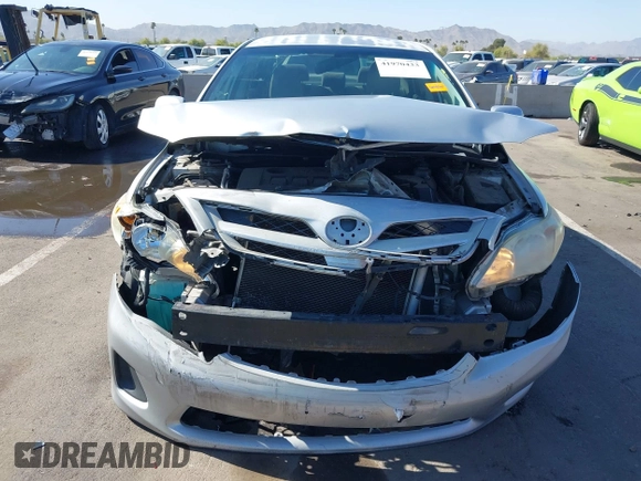2011 Toyota Corolla L with VIN JTDBU4EE0B9151332, listed as a IAAI auction lot 41970433 with 113,157 mi miles. Bid and sale history available at carsss.com. Image 6.