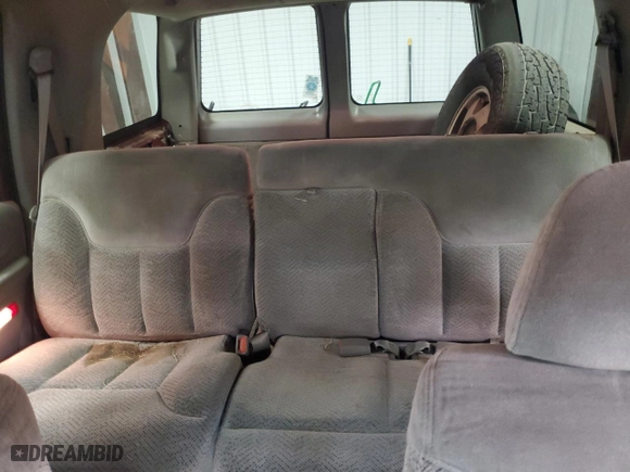 1998 Chevrolet Tahoe with VIN 1GNEK13R7WJ308146, listed as a Copart auction lot 87843305 with 180,920 mi miles and Clean Title. Bid and sale history available at carsss.com. Image 10.