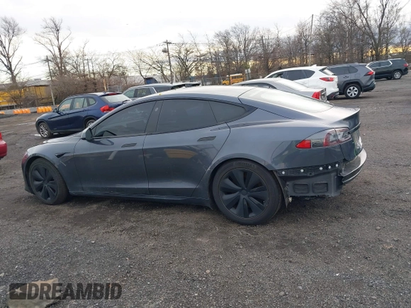 2021 Tesla Model S Long Range with VIN 5YJSA1E51MF440929, listed as a IAAI auction lot 41144902 with Not provided miles and . Bid and sale history available at DreamBid. Image 14.