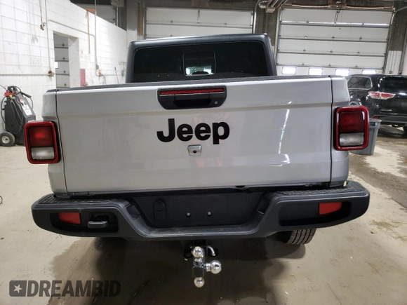 2022 Jeep Gladiator Sport S with VIN 1C6HJTAG5NL117583, listed as a Copart auction lot 51912425 with 69,739 mi miles and Salvage title. Bid and sale history available at DreamBid. Image 6.
