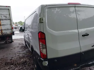 2019 Ford Transit with VIN 1FTYR2ZG0KKA10216, listed as a IAAI auction lot 42178300 with 187,096 mi miles and . Bid and sale history available at DreamBid. Image 3.