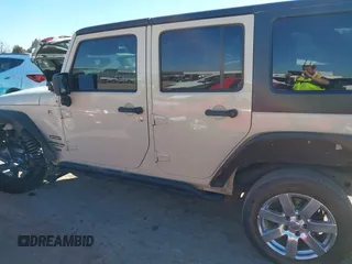 2012 Jeep Wrangler Unlimited Sport z VIN 1C4BJWDG8CL102486, wystawiony jako IAAI lot #41386649 z przebiegiem 156 993 mil mil oraz . Historia ofert i sprzedaży dostępna na DreamBid. Obrazek 14.
