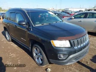 2013 Jeep Compass Sport with VIN 1C4NJDBB4DD113831, listed as a IAAI auction lot 42059122 with 135,062 mi miles. Bid and sale history available at carsss.com. Image 1.