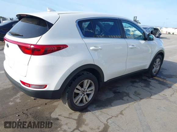 2019 Kia Sportage LX with VIN KNDPM3AC0K7535675, listed as a IAAI auction lot 41933482 with 118,012 mi miles and . Bid and sale history available at DreamBid. Image 4.
