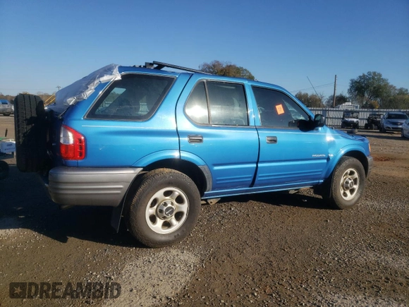 2001 Isuzu Rodeo S with VIN 4S2DM58WX14301336, listed as a Copart auction lot 77770164 with Not provided miles and Salvage title. Bid and sale history available at DreamBid. Image 3.