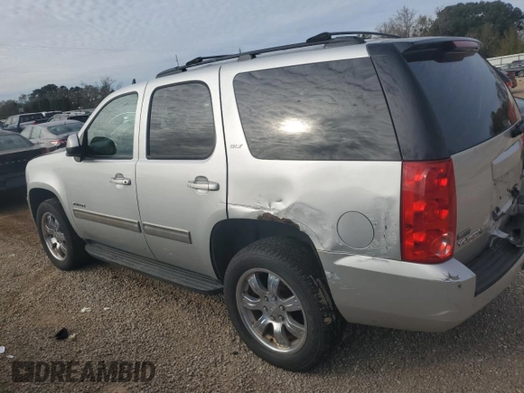2011 GMC Yukon SLT with VIN 1GKS2CE05BR133563, listed as a Copart auction lot 87870555 with 100,370 mi miles and Clean Title. Bid and sale history available at carsss.com. Image 2.