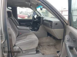 2003 GMC Yukon SLT with VIN 1GKEC13V33J287668, listed as a IAAI auction lot 41561108 with 326,719 mi miles. Bid and sale history available at carsss.com. Image 5.