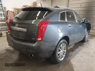 2013 Cadillac SRX Performance Collection with VIN 3GYFNHE37DS530908, listed as a IAAI auction lot 41662796 with 80,254 mi miles. Bid and sale history available at carsss.com. Image 4.