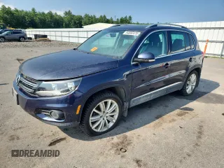 2013 Volkswagen Tiguan SEL with VIN WVGBV3AXXDW056999, listed as a Copart auction lot 64880475 with 148,050 mi miles and Clean title. Bid and sale history available at DreamBid. Image 1.