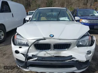 2015 BMW X1 xDrive28i with VIN WBAVL1C59FVY40443, listed as a IAAI auction lot 41777176 with 91,560 mi miles. Bid and sale history available at carsss.com. Image 6.