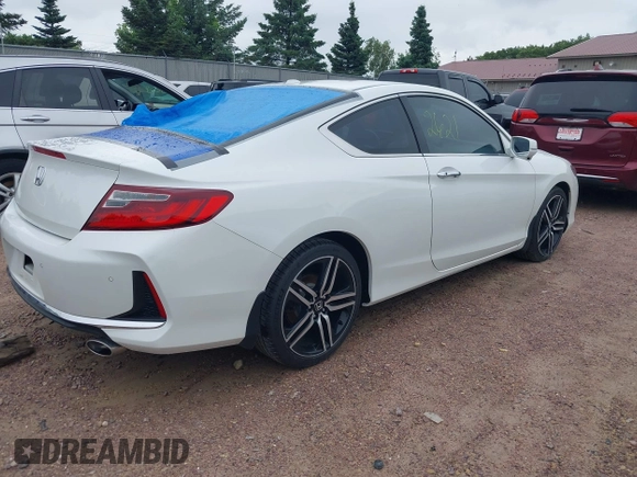 2016 Honda Accord Touring with VIN 1HGCT2B09GA007614, listed as a IAAI auction lot 42532621 with 200,935 mi miles and . Bid and sale history available at DreamBid. Image 4.
