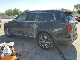 2020 Cadillac XT6 AWD Premium Luxury with VIN 1GYKPFRS7LZ151987, listed as a Copart auction lot 58315214 with 62,566 mi miles and Salvage Title. Bid and sale history available at carsss.com. Image 2.