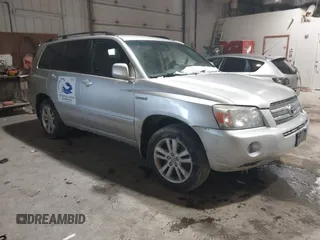 2006 Toyota Highlander Hybrid with VIN JTEDW21A260009306, listed as a IAAI auction lot 41624043 with 261,596 mi miles. Bid and sale history available at carsss.com. Image 1.
