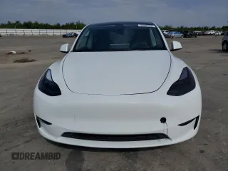 2022 Tesla Model Y Performance с VIN 7SAYGDEF4NF403784, выставлен на аукционе Copart как лот 53392595 с пробегом 51 023 миль миль и Списание • Salvage title. История ставок и продаж доступна на DreamBid. Изображение 5.