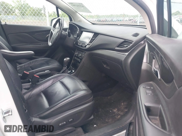 2019 Buick Encore Essence with VIN KL4CJGSM2KB876329, listed as a IAAI auction lot 42101397 with 84,020 mi miles. Bid and sale history available at carsss.com. Image 5.