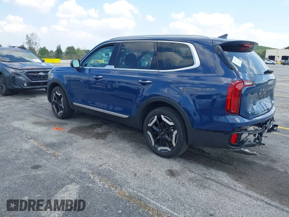 2025 Kia Telluride S with VIN 5XYP64GC0SG581646, listed as a IAAI auction lot 42063284 with 12,561 mi miles and . Bid and sale history available at DreamBid. Image 3.