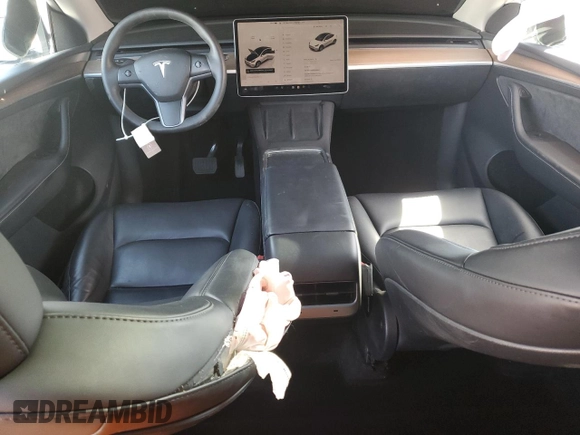 2023 Tesla Model Y Long Range z VIN 7SAYGDEE8PF816544, wystawiony jako Copart lot #57170485 z przebiegiem 74 598 mil mil oraz Szkoda całkowita • Salvage title. Historia ofert i sprzedaży dostępna na DreamBid. Obrazek 8.