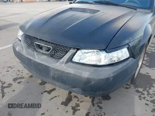 2000 Ford Mustang GT with VIN 1FAFP45X1YF165489, listed as a IAAI auction lot 41926293 with 144,312 mi miles. Bid and sale history available at carsss.com. Image 6.