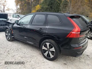 2024 Volvo XC60 Recharge Plug-In Hybrid Core Dark Theme with VIN YV4H60DK1R1939885, listed as a Copart auction lot 77381144 with 3,246 mi miles and Salvage Title. Bid and sale history available at carsss.com. Image 2.