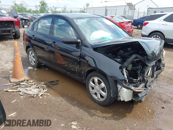 2006 Hyundai Accent GLS z VIN KMHCN46C76U038040, wystawiony jako IAAI lot #42220455 z przebiegiem 140 413 mil mil oraz . Historia ofert i sprzedaży dostępna na DreamBid. Obrazek 1.