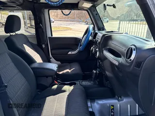 2012 Jeep Wrangler Arctic z VIN 1C4AJWBG2CL229572, wystawiony jako Copart lot #48719465 z przebiegiem 82 619 mil mil oraz Czysty tytuł • Clean title. Historia ofert i sprzedaży dostępna na DreamBid. Obrazek 5.