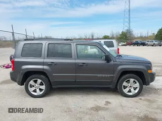 2014 Jeep Patriot Latitude with VIN 1C4NJRFB3ED731313, listed as a IAAI auction lot 42161426 with 118,858 mi miles and . Bid and sale history available at DreamBid. Image 13.