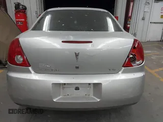 2005 Pontiac G6 z VIN 1G2ZG528154120400, wystawiony jako IAAI lot #42332980 z przebiegiem 171 359 mil mil oraz . Historia ofert i sprzedaży dostępna na DreamBid. Obrazek 16.